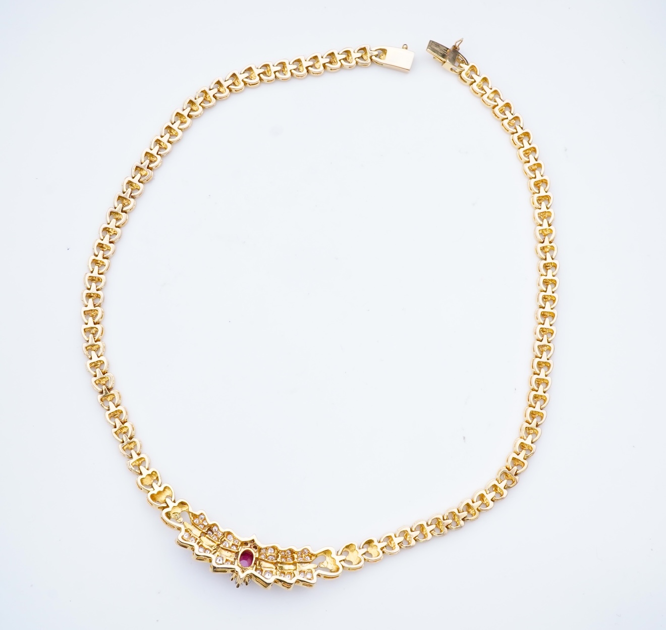 A diamond and synthetic ruby necklace